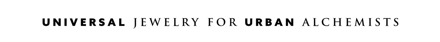 Headline with words reading "universal jewelry for urban alchemists". This is the tagline of our streetwear jewelry brand.